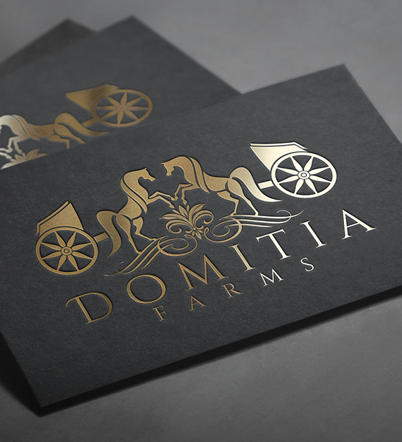 Sophisticated logo design for Domitia Farms, featuring golden horse silhouettes and a vintage carriage motif.