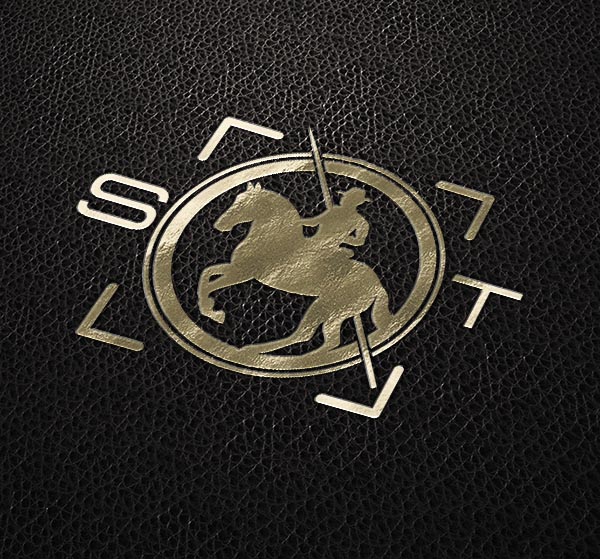 Gold horse photography logo featuring a rider on a horse within a circular frame and camera focus elements on a textured black background.